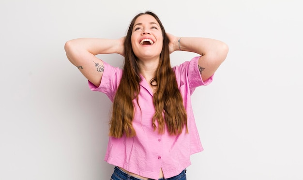 smiling and feeling relaxed satisfied and carefree laughing positively and chilling