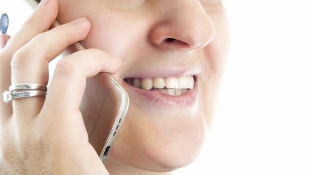 smiling female mouth talking by phone.