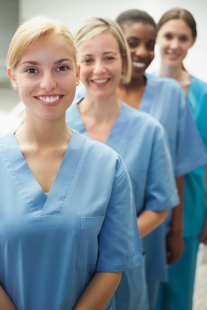 Photo smiling female nurses looking at camera