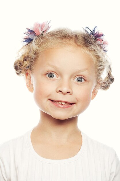 Smiling girl isolated over white