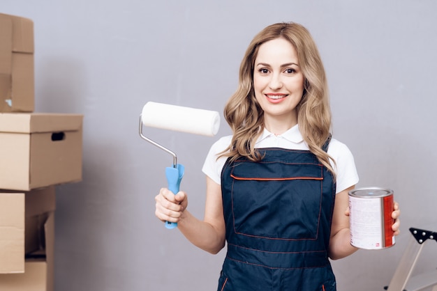 Smiling Girl Master with Paint and Brush in Hand.