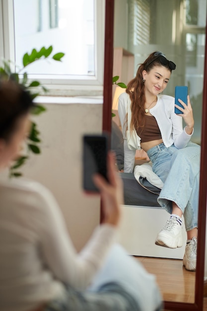 Smiling Girl Taking Photo for Blog