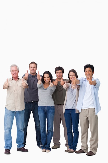 Smiling group giving thumbs up