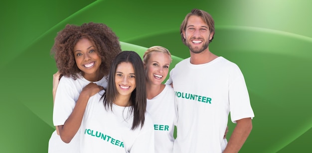 Photo smiling group of volunteers against abstract green design