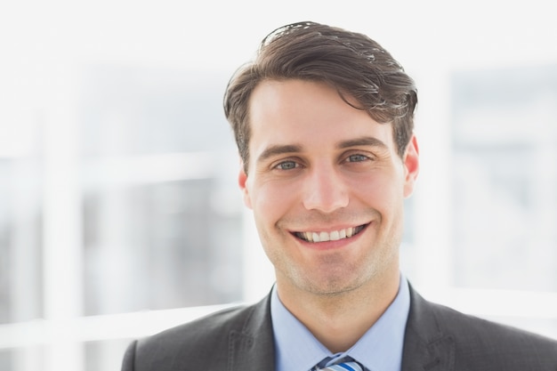 Smiling handsome businessman