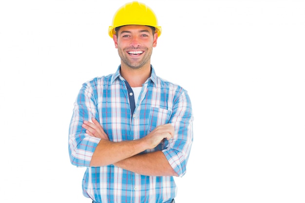 Smiling handyman standing arms crossed