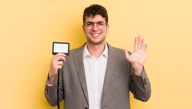 Smiling happily waving hand welcoming and greeting you