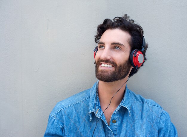 Smiling happy man with headphones 