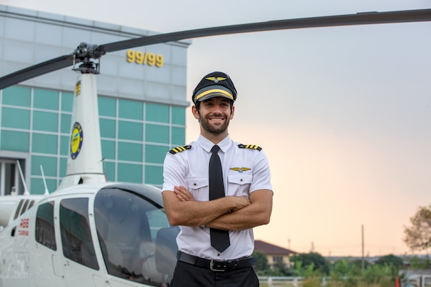 Smiling helicopter pilot in uniform