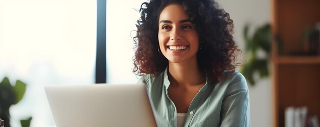 Smiling Hispanic woman having a virtual conference at home Joyful video call with webcam Concept Virtual Conference Hispanic Woman Smiling Joyful Webcam