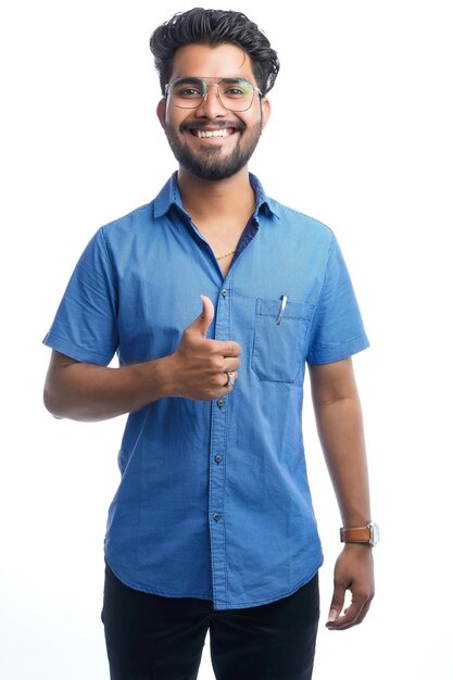 Smiling indian handsome asian male with positive expression posing