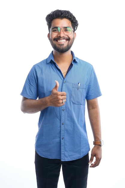 Smiling indian handsome asian male with positive expression posing