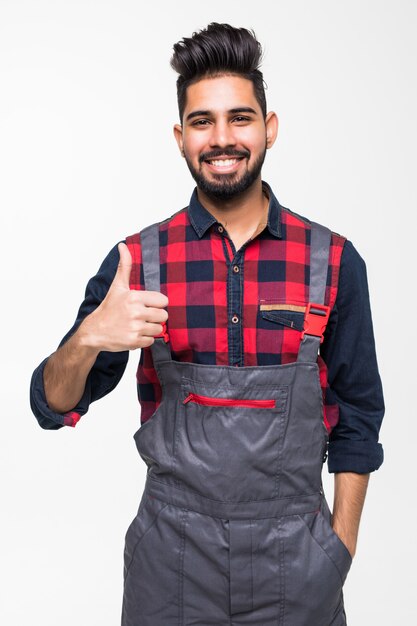 Smiling indian man worker thumbs up on white space