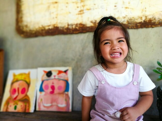 Smiling innocent girl looking away