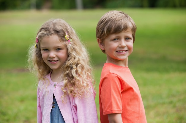 Smiling kids standing at the park