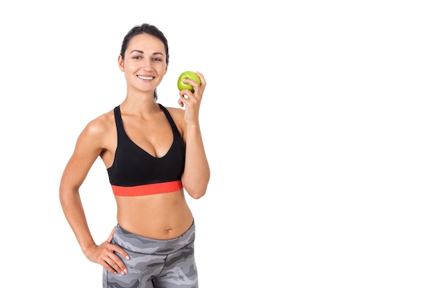 Smiling lady with a green apple