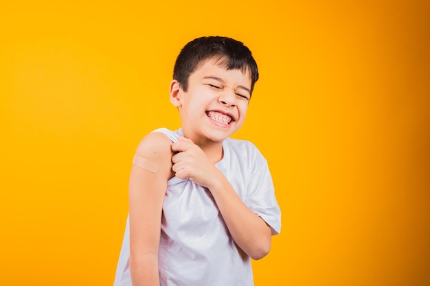 Smiling little boy after having received a vaccination.