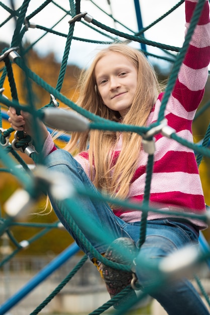 Smiling little girl at the playground