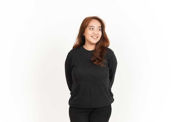 Smiling and Look Aside Of Beautiful Asian Woman Wearing Black Shirt Isolated On White Background