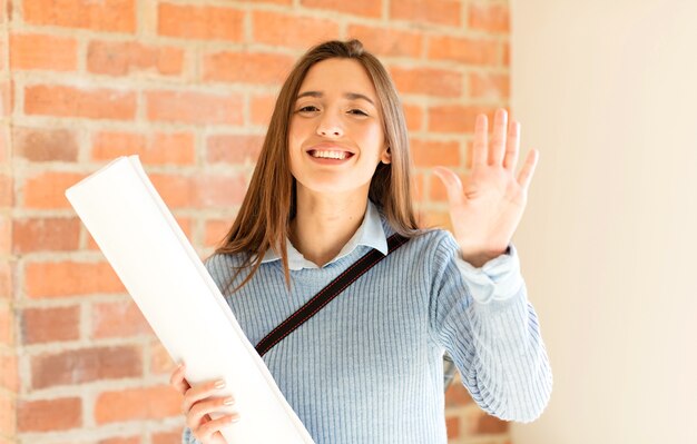 smiling and looking friendly, showing number five or fifth with hand forward, counting down