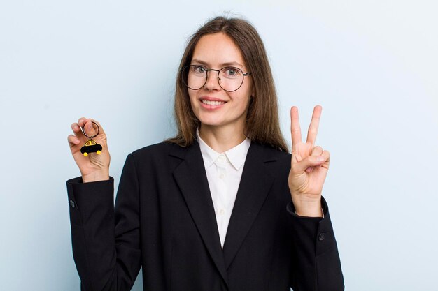 Smiling and looking happy gesturing victory or peace