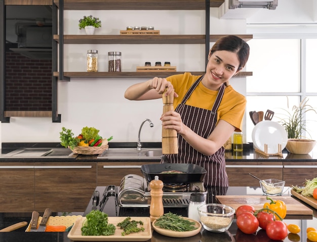smiling man holding food at home