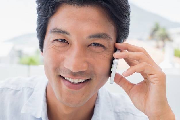 Smiling man on phone call