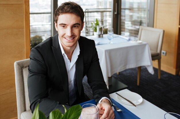 Smiling Man in restaurant