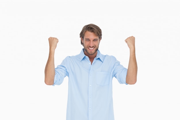 Smiling man in shirt cheering