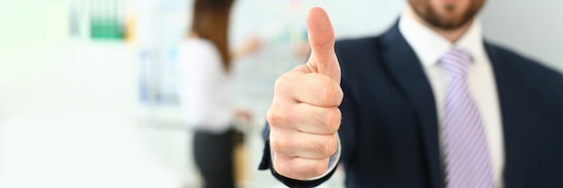 Smiling man working in office