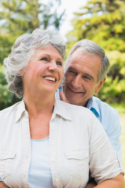 Smiling mature couple in park