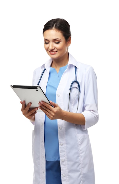 Smiling medical doctor holding a tablet isolated on white