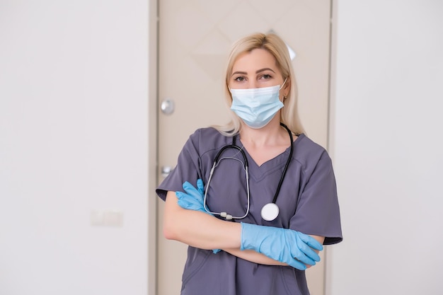 Smiling medical woman doctor. Isolated over white background.