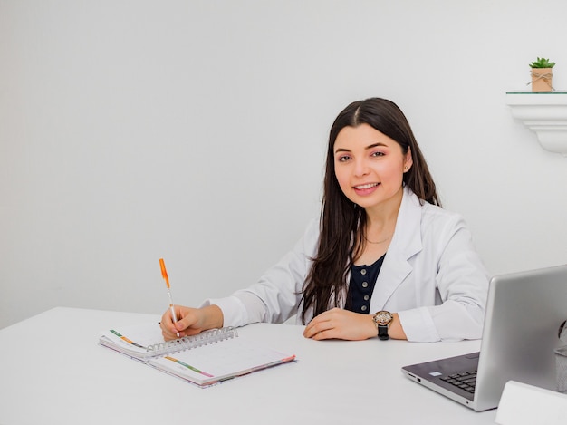 Smiling nutritionist in her office