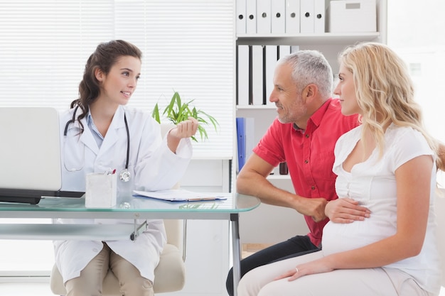 Smiling patient consulting a doctor 