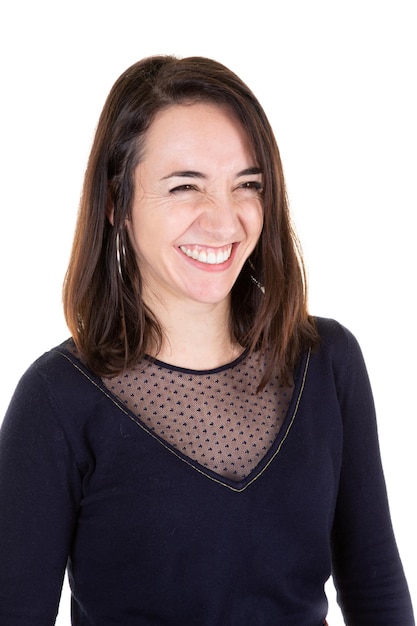 Smiling pretty brunette woman laughing eyes clossed on white background