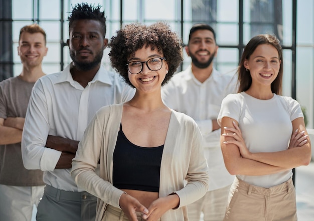 Smiling professional business leaders and employees group team portrait