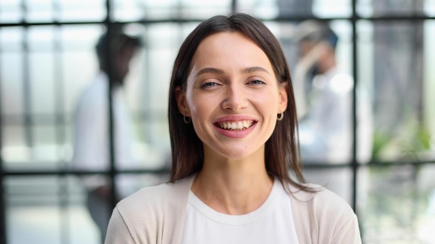 Smiling professional business leaders and employees group team portrait