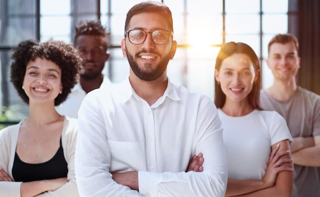 Smiling professional business leaders and employees group team portrait