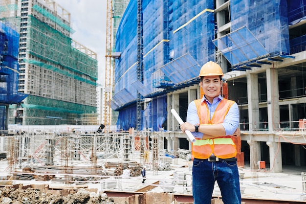 Smiling professional construction engineer