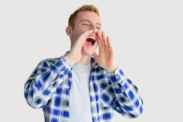 Smiling Red Haired Guy Shouting Loud