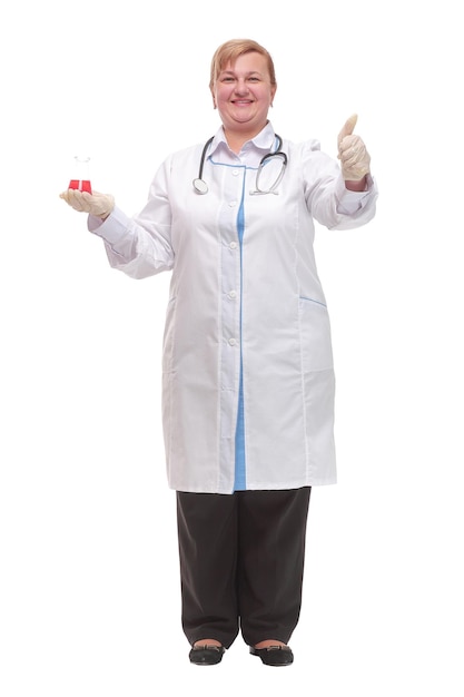 Smiling scientist or doctor holding a flask gives the thumbs up