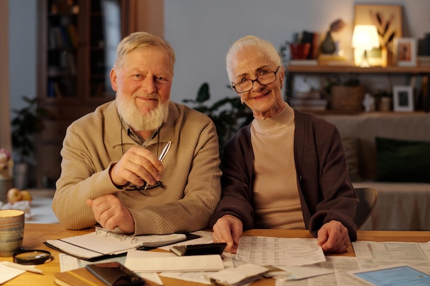 Smiling senior couple in casual attire