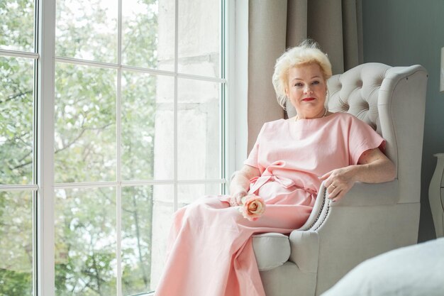 Smiling senior woman at home