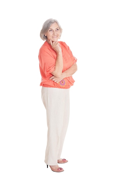 Smiling senior woman posing isolated on white background