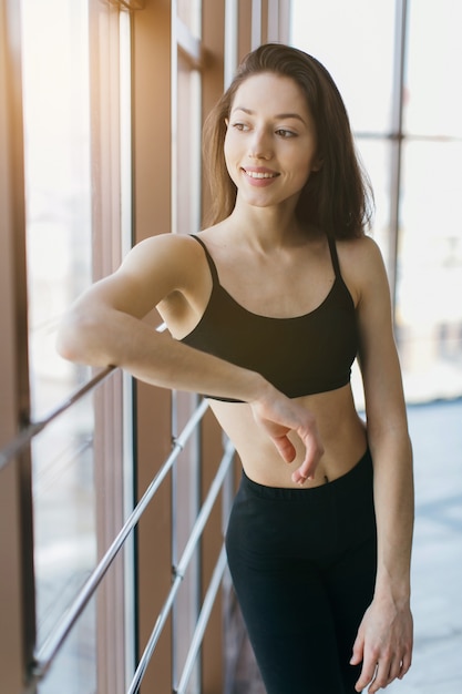 Smiling sensual fit woman