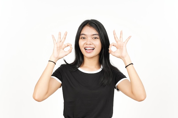 Photo smiling and showing ok sign of beautiful asian woman isolated on white background