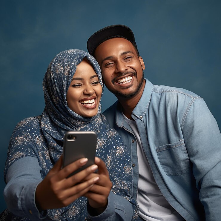 Smiling Somali couple in denim shirts having fun