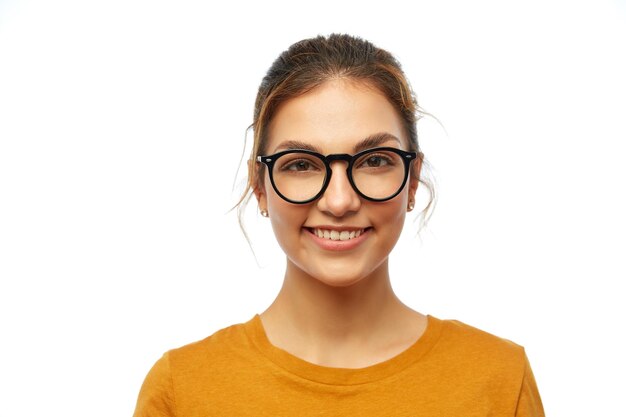 Photo smiling student girl in glasses over white