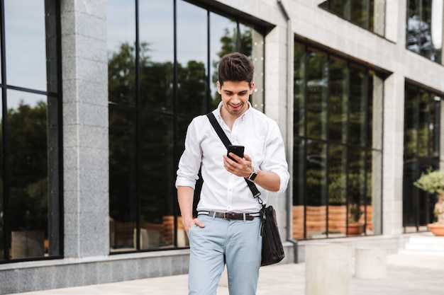 Smiling successful young businessman